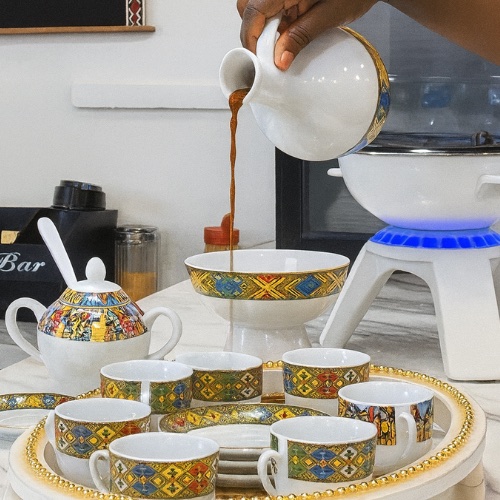 Traditional Ethiopian coffee cups arranged on woven basket