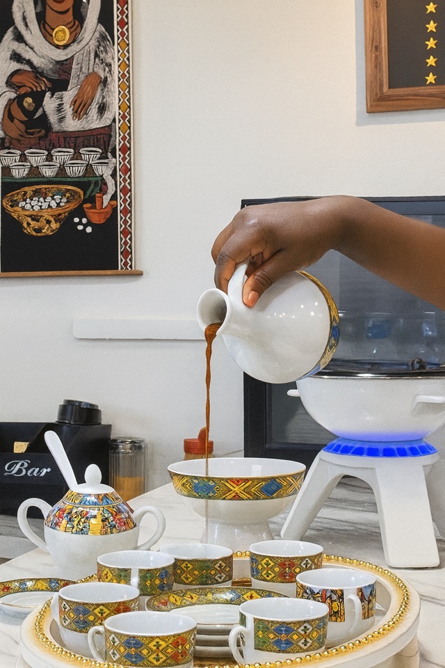 Ethiopian coffee service arranged on a traditional woven basket